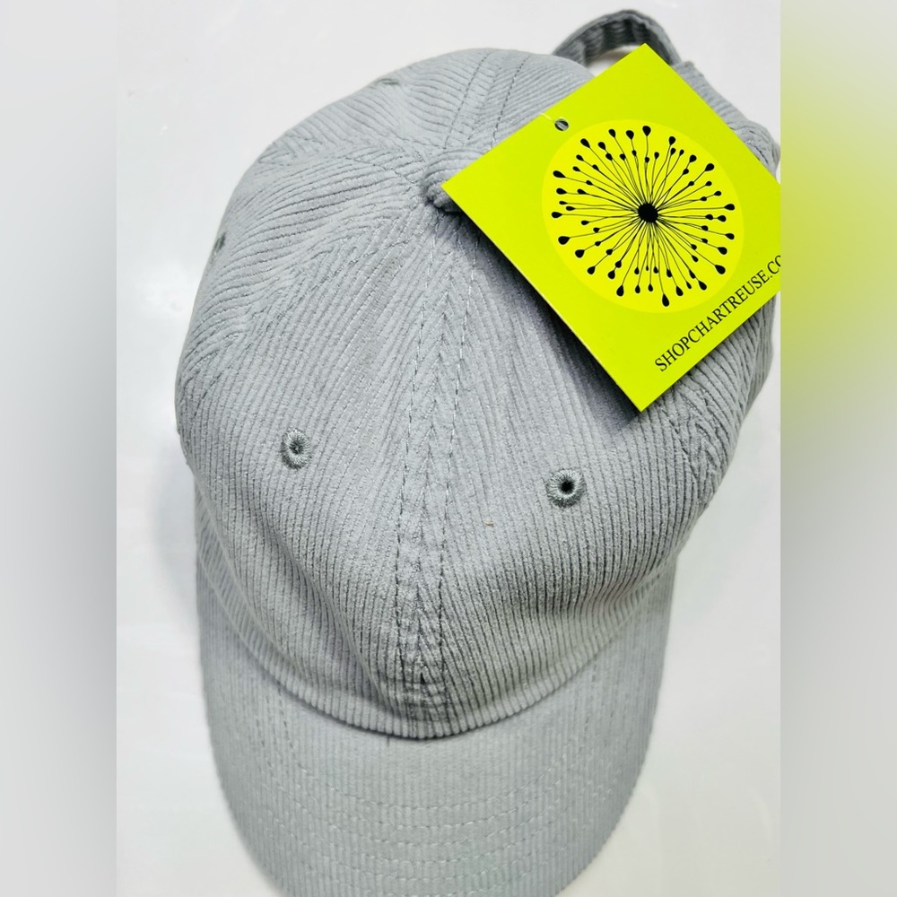 Brand new, never used, tags still attached, light gray corduroy baseball cap.